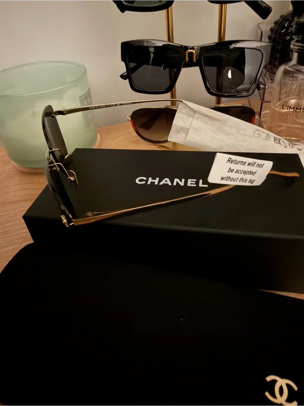 CHANEL Black Frame Sunglasses with Dark Lenses